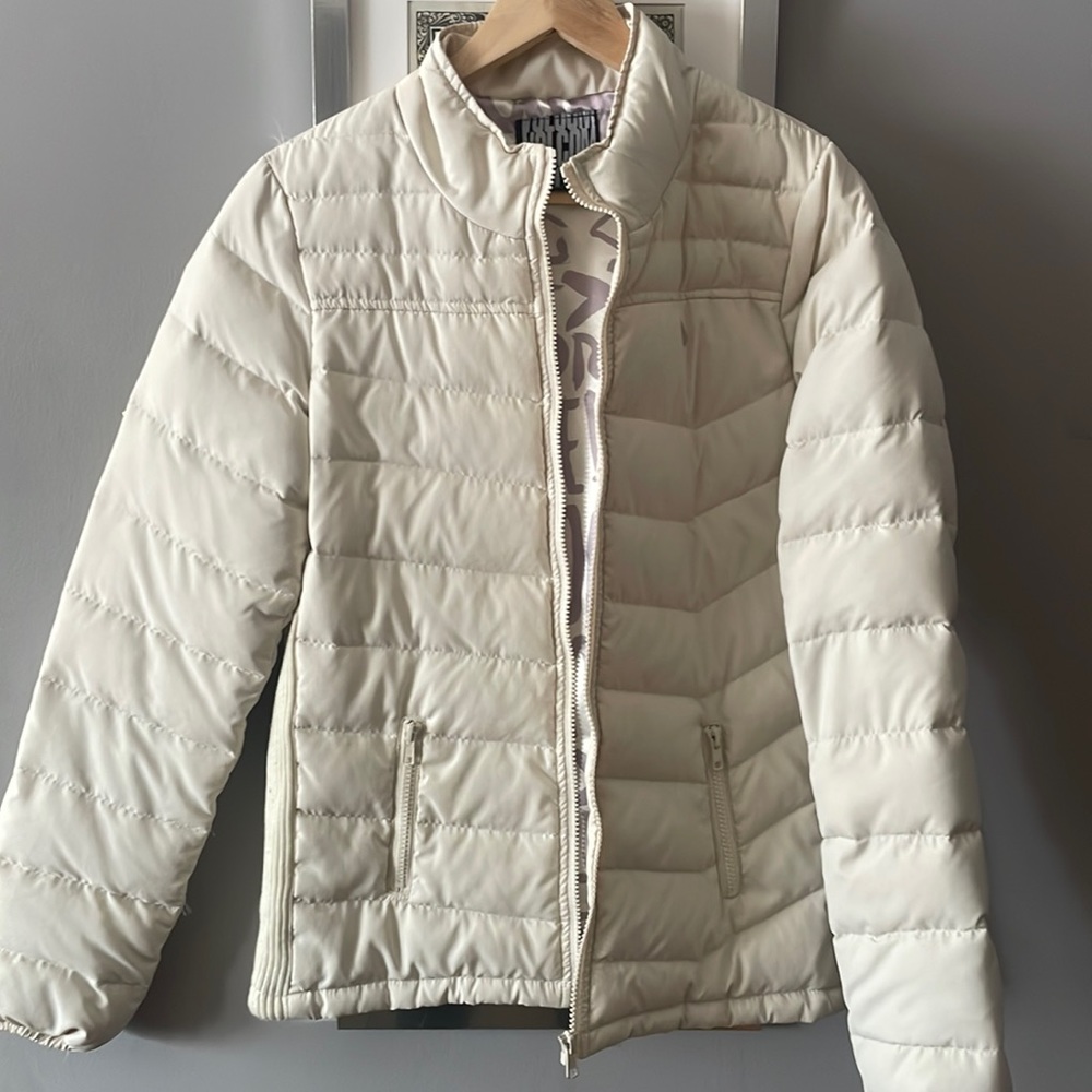 Cream color ski jacket